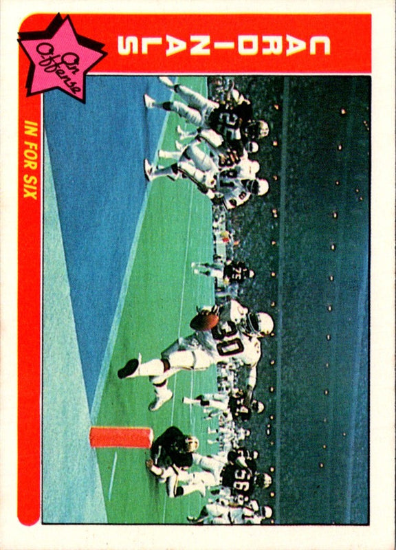 1984 Fleer Team Action A running back in trouble (Defense) #24