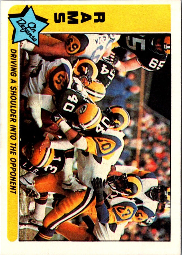 1985 Fleer Team Action Driving a Shoulder into the Opponent (Defense) #41