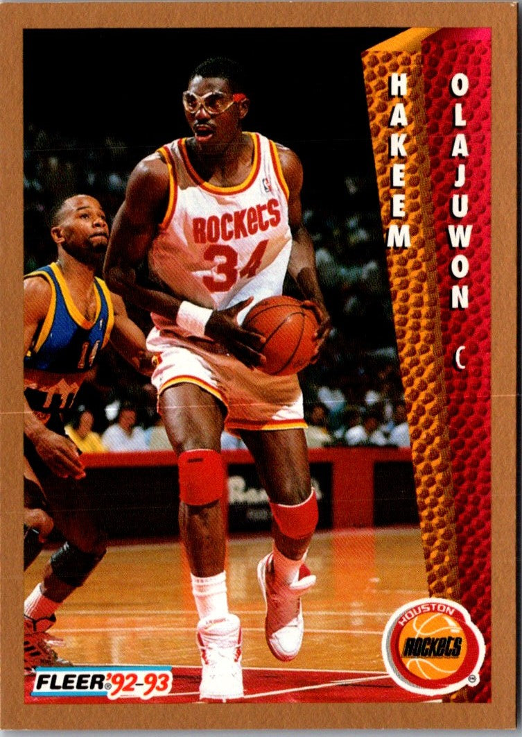 1992 Fleer NBA Red-Hot Stars Golden Magazine Perforated Hakeem Olajuwon