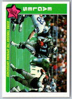 1985 Fleer Team Action Going Through the Opening Untouched (Offense) #61