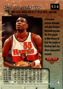 1996 SkyBox Premium Star Ruby Dikembe Mutombo