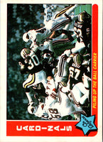 1985 Fleer Team Action Piling Up the Ball Carrier (Defense) #68