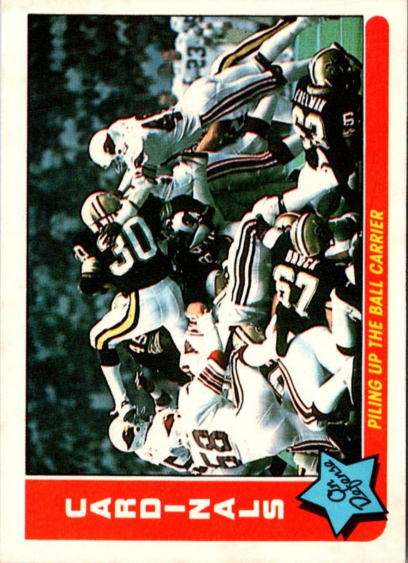 1985 Fleer Team Action Piling Up the Ball Carrier (Defense) #68