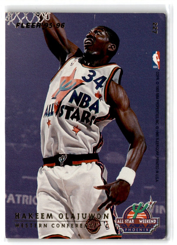 1995 SkyBox E-XL Blue Hakeem Olajuwon #32