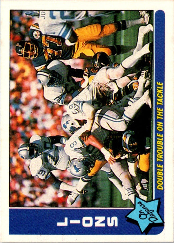 1985 Fleer Team Action Double Trouble on the Tackle (Defense) #23
