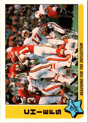 1985 Fleer Team Action Reaching for the Deflection (Defense) #35