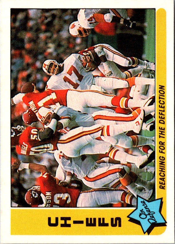 1985 Fleer Team Action Reaching for the Deflection (Defense) #35