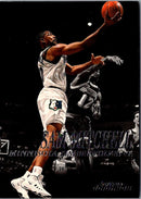 1999 SkyBox Sam Mitchell