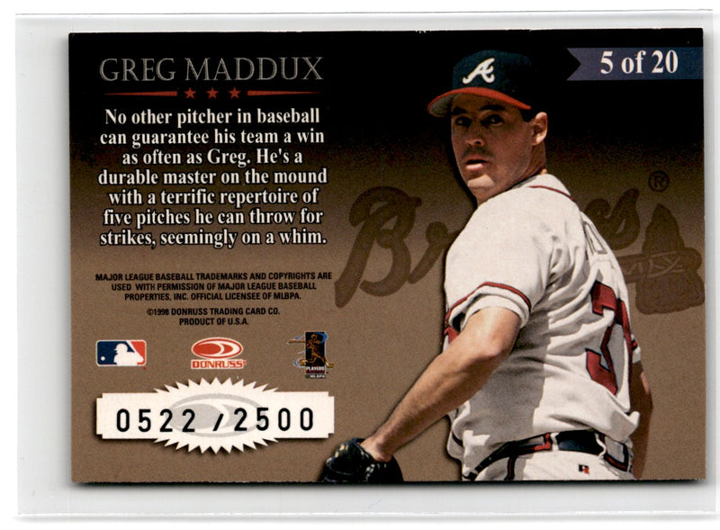 1997 Donruss Armed and Dangerous Greg Maddux